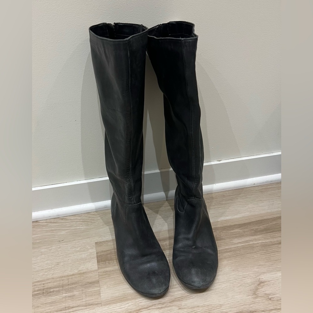 Women’s tall black leather boots